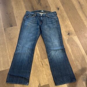 7 For All Mankind Blue Bootcut Jeans with Faded Wash